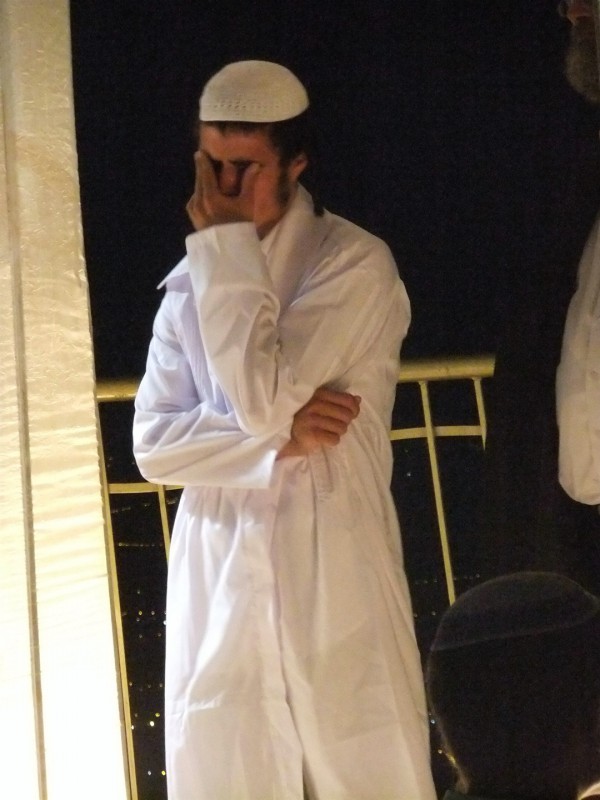 An ultra-Orthodox Jewish groom wears a kittel Kittel-Wedding-Robe-Yom Kippur