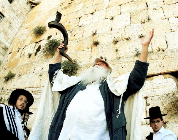 An Orthodox Jewish man at the Western (Wailing) Wall prays Orthodox-Jewish-man-prays-Government-Press-Office-GPO-Slichot-Prayer