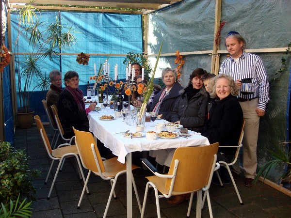 Dutch Jews Enjoy a Meal in the Sukkah Sukkah-Shoshanna-Synagogue-Deventer