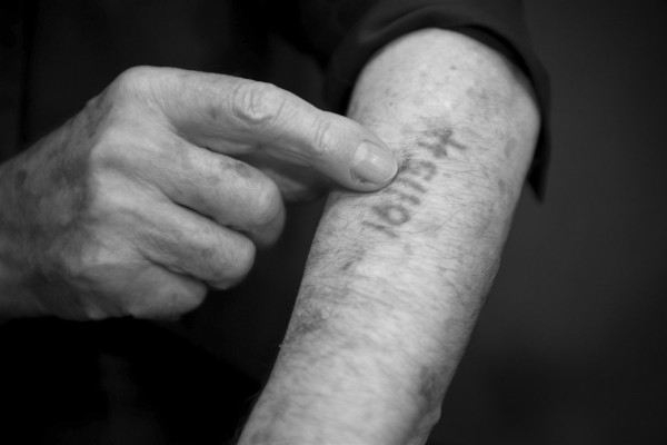 An 80-year-old Holocaust survivor living in Tiberias, Israel, shows the tattoo the Nazis marked him with in a concentration camp during the Holocaust. An 80-year-old Holocaust survivor living in Tiberias, Israel, shows the tattoo the Nazis marked him with in a concentration camp during the Holocaust.