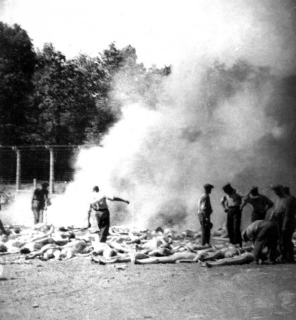 This secret photograph taken by a Sonderkommando is a cropped version of one of four photographs from Auschwitz-Birkenau, part of a series known as the Sonderkommando photographs. This photograph, number 280, shows bodies waiting to be burned in an outdoor fire pit. This secret photograph taken by a Sonderkommando is a cropped version of one of four photographs from Auschwitz-Birkenau, part of a series known as the Sonderkommando photographs. This photograph, number 280, shows bodies waiting to be burned in an outdoor fire pit.