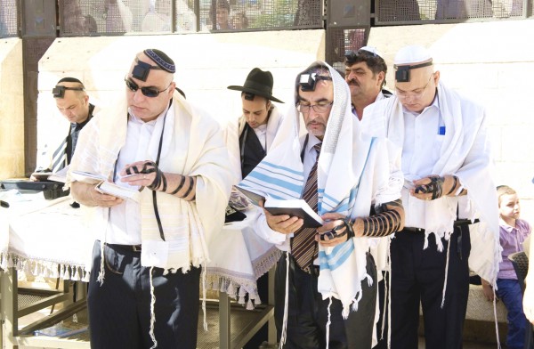 Image result for picture of man wearing phlayctery at wailing wall