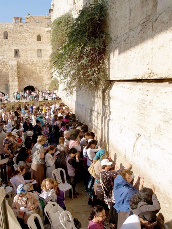 Jewish women pray at the Western (Wailing) Wall in Jerusalem. The Wall was part of the retaining structure that supported the Temple Mount. Of the four walls, the Western Wall is thought to be the closest to the spot where the Temple was located. While the Temple Mount is Judaism's holiest site, the Western Wall is Judaism's second, deriving its holiness from the Mount itself. Jewish women pray at the Western (Wailing) Wall in Jerusalem. The Wall was part of the retaining structure that supported the Temple Mount. Of the four walls, the Western Wall is thought to be the closest to the spot where the Temple was located. While the Temple Mount is Judaism's holiest site, the Western Wall is Judaism's second, deriving its holiness from the Mount itself.