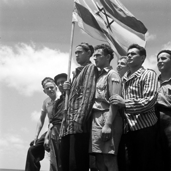 A group of former Buchenwald concentration camp inmates on board the refugee ship Mataroa in Haifa Port (July 7, 1945). (GPO photo by Kluger Zoltan) A group of former Buchenwald concentration camp inmates on board the refugee ship Mataroa in Haifa Port (July 7, 1945). (GPO photo by Kluger Zoltan)