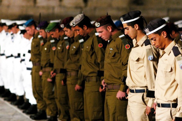 Israeli-soldiers-stand-in-formation-during-a-ceremony-to-mark-the-beginning-of-Memorial-Day-or-Yom-Hazikaron-at-the-Kotel Kotel, Western Wall, Yom HaZikaron